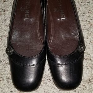 Chanel black flats w/ camellia flower detailing